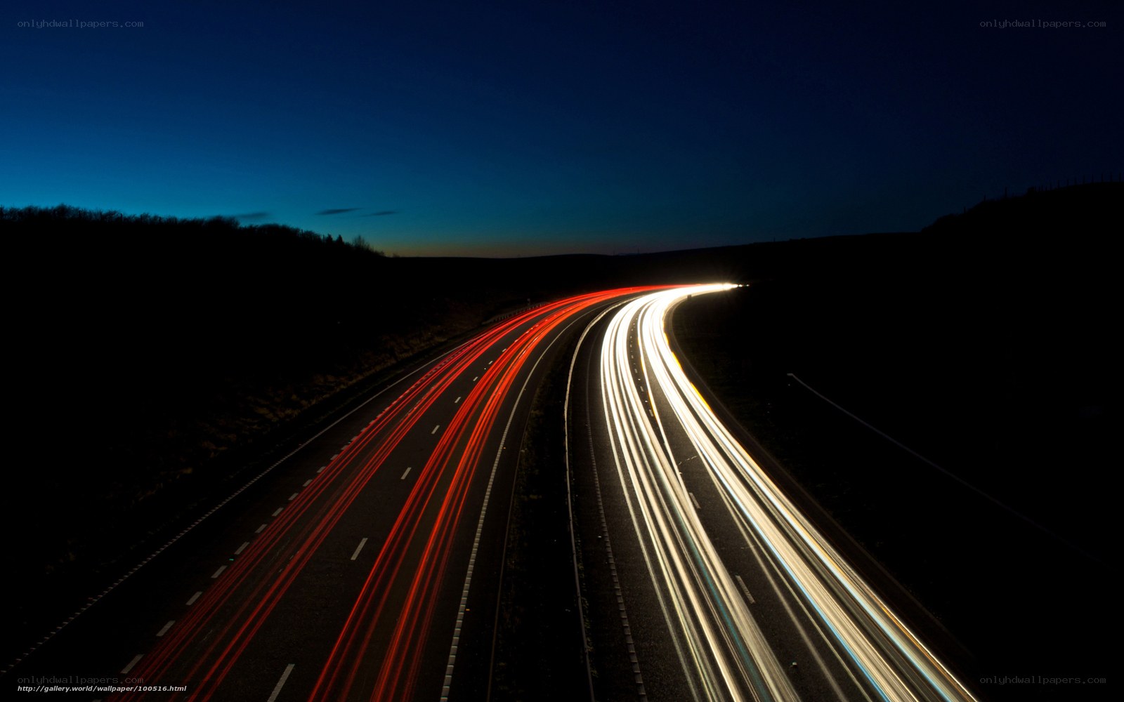 Light trails on a highway at night