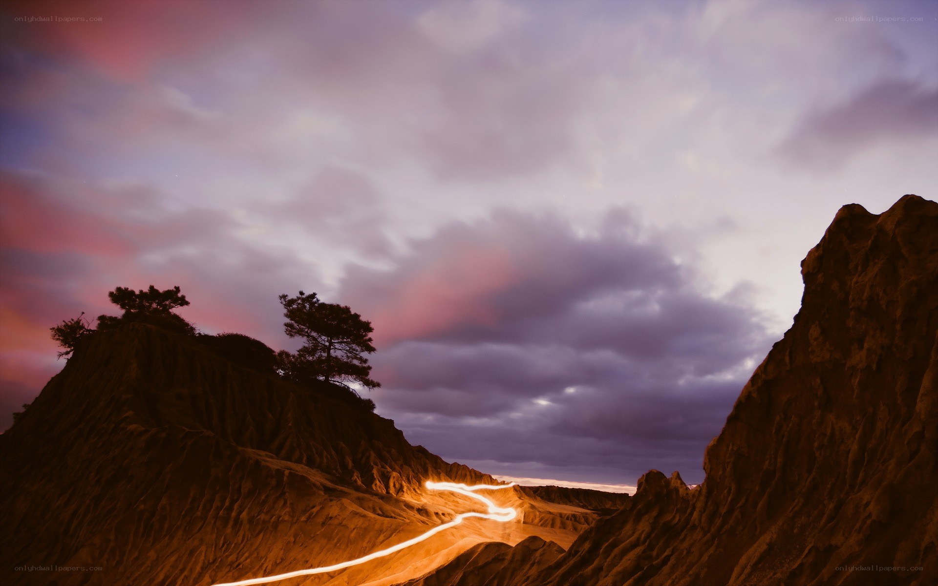 Light trails on a rocky landscape