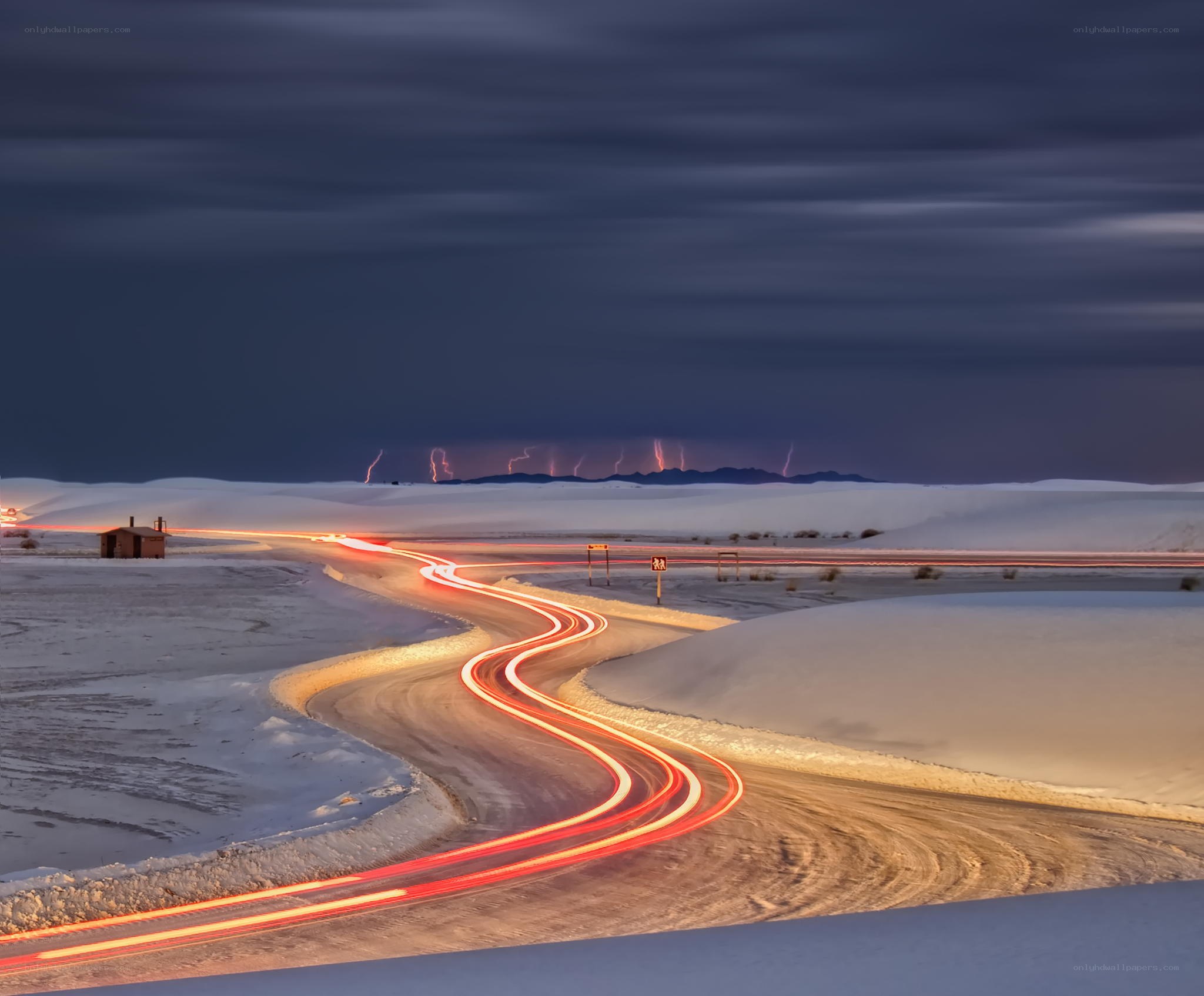 Light trails on a snowy road