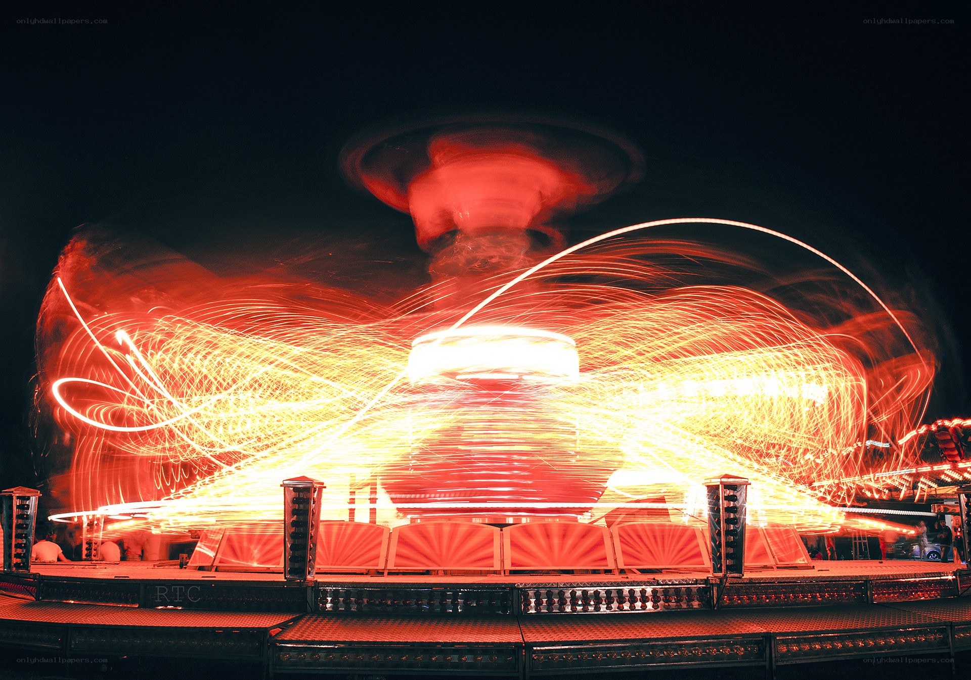 Light trails on a spinning ride