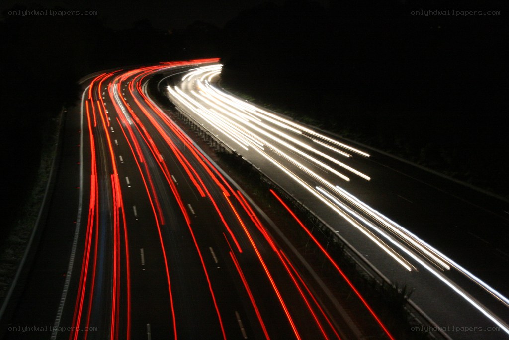 Light trails on a winding highway