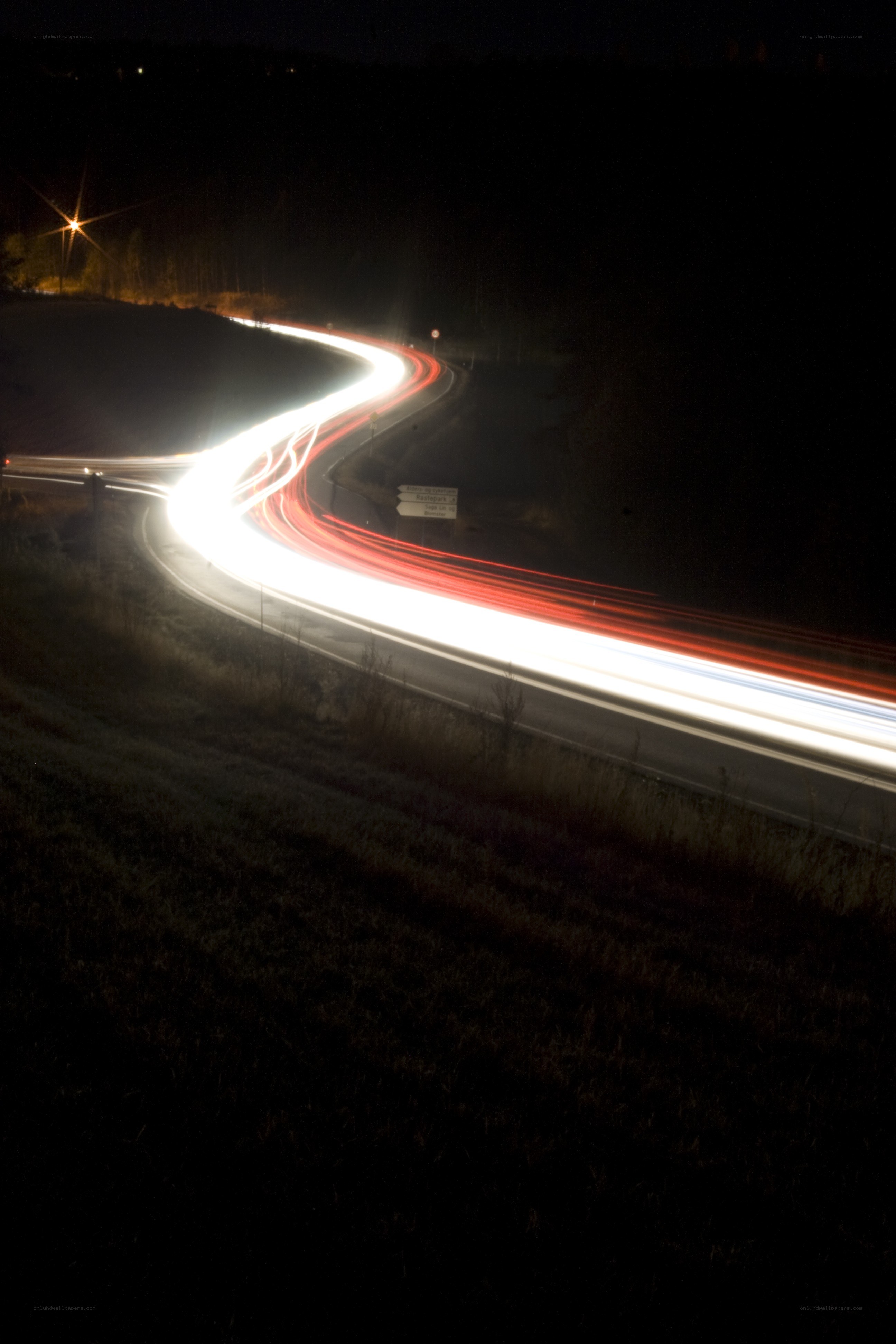 Light trails on a winding road