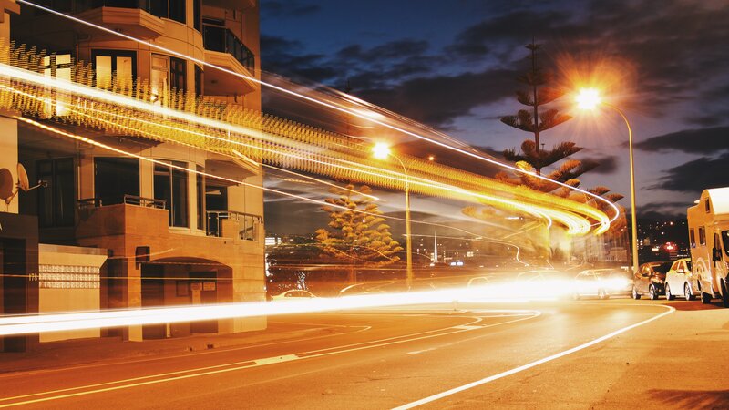 Light Trails on City Street — Orange, Dramatic