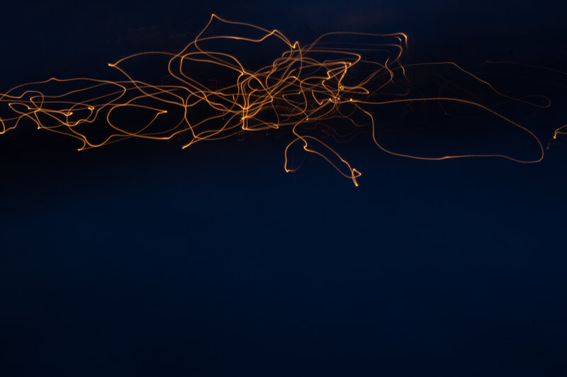 Light Trails on Dark Background — Blue