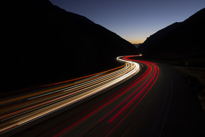 Light Trails on Highway — Black, Dramatic, Night, Photograph, Mountains