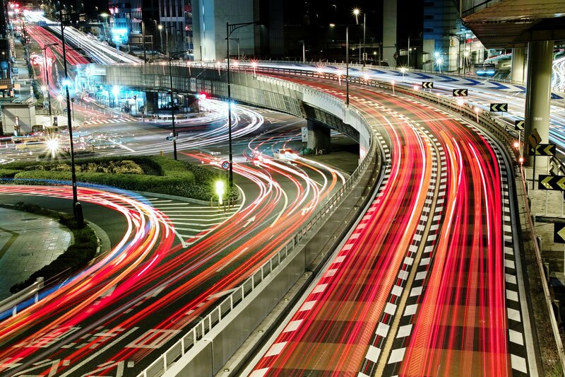 Light Trails on Highway — Red, Dynamic, Night, Photograph, Traffic, Buildings, Streetlights
