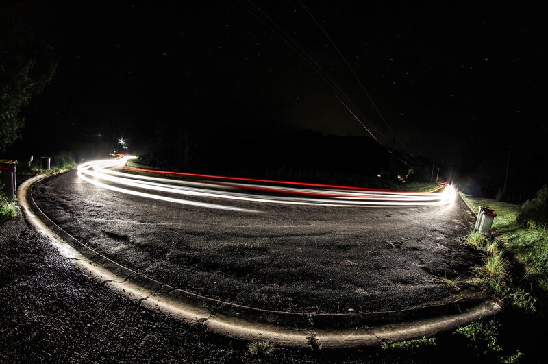 Light Trails on Road — Black, Dark, Night, Photograph, Car Lights, Trash Cans