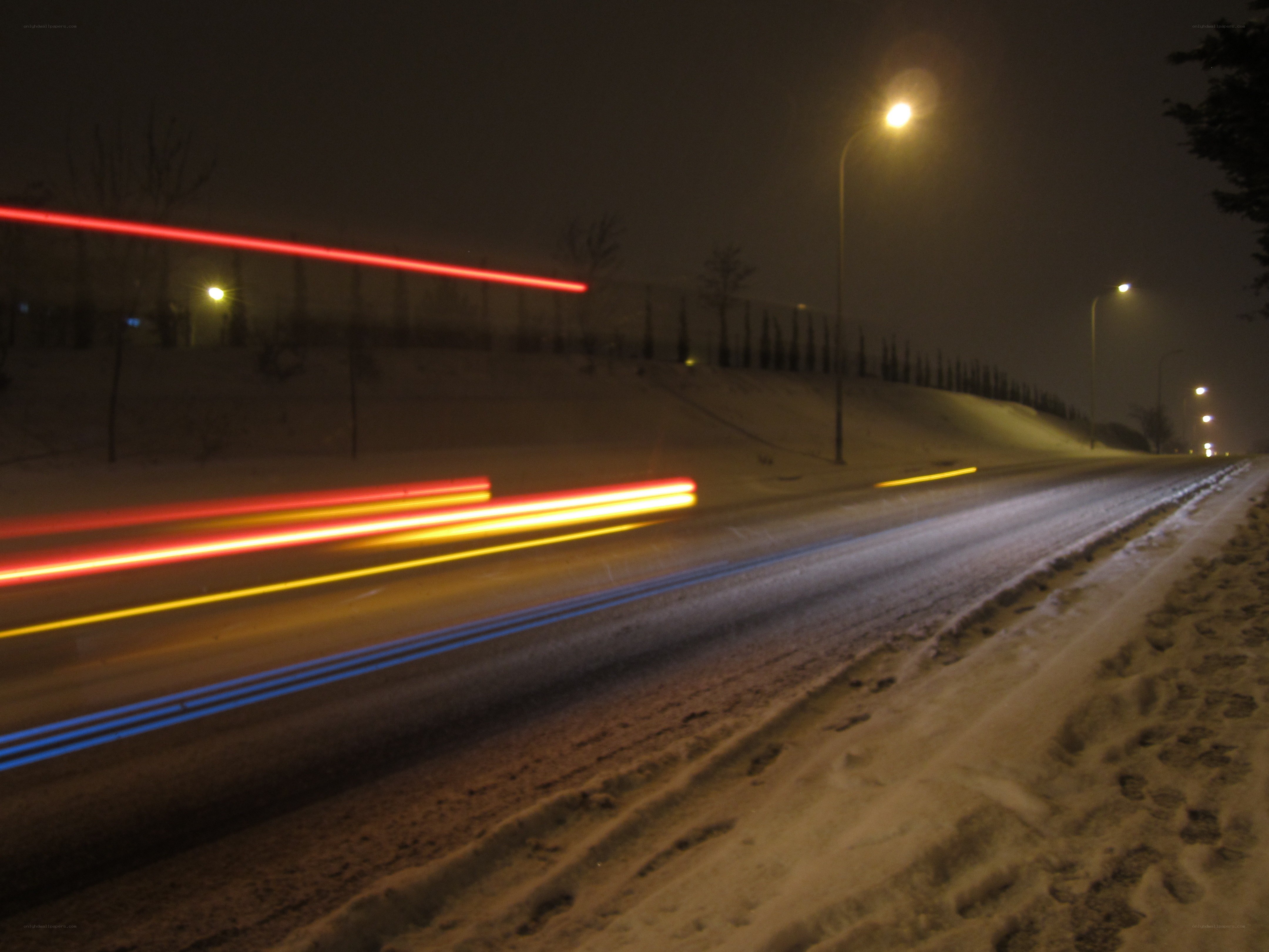 Light trails on snowy road