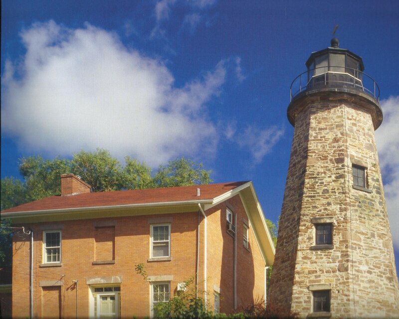 Lighthouse and Brick Building