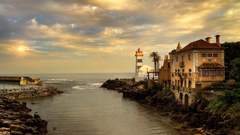 Lighthouse and Coastal Buildings — Golden