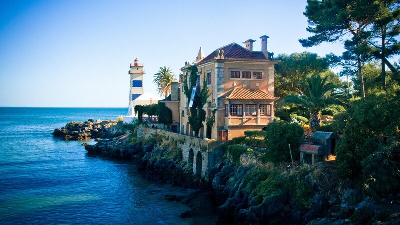 Lighthouse and Coastal House