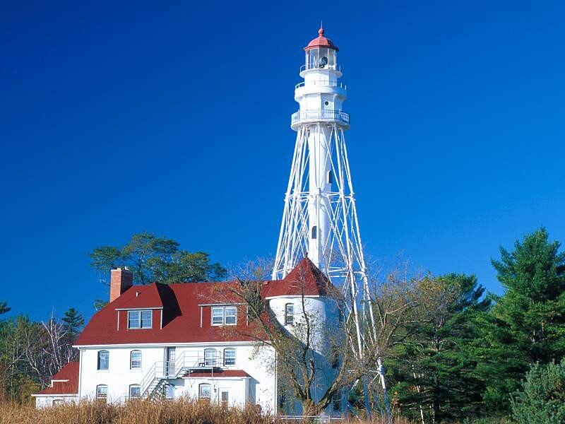 Lighthouse and Keeper's House — Blue, Serene, Afternoon, Photograph, Trees, Sky