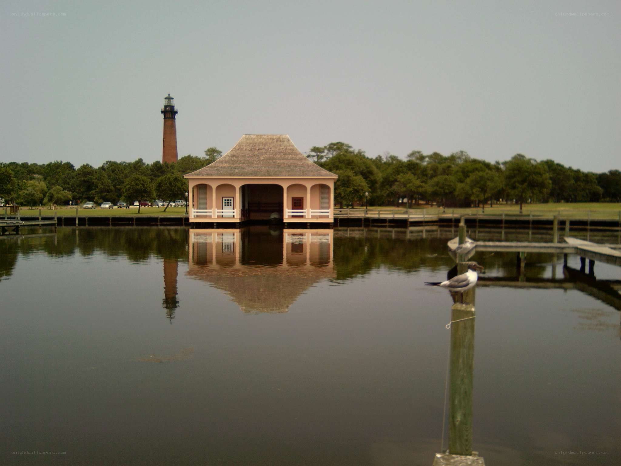lighthouse and pavilion by the water