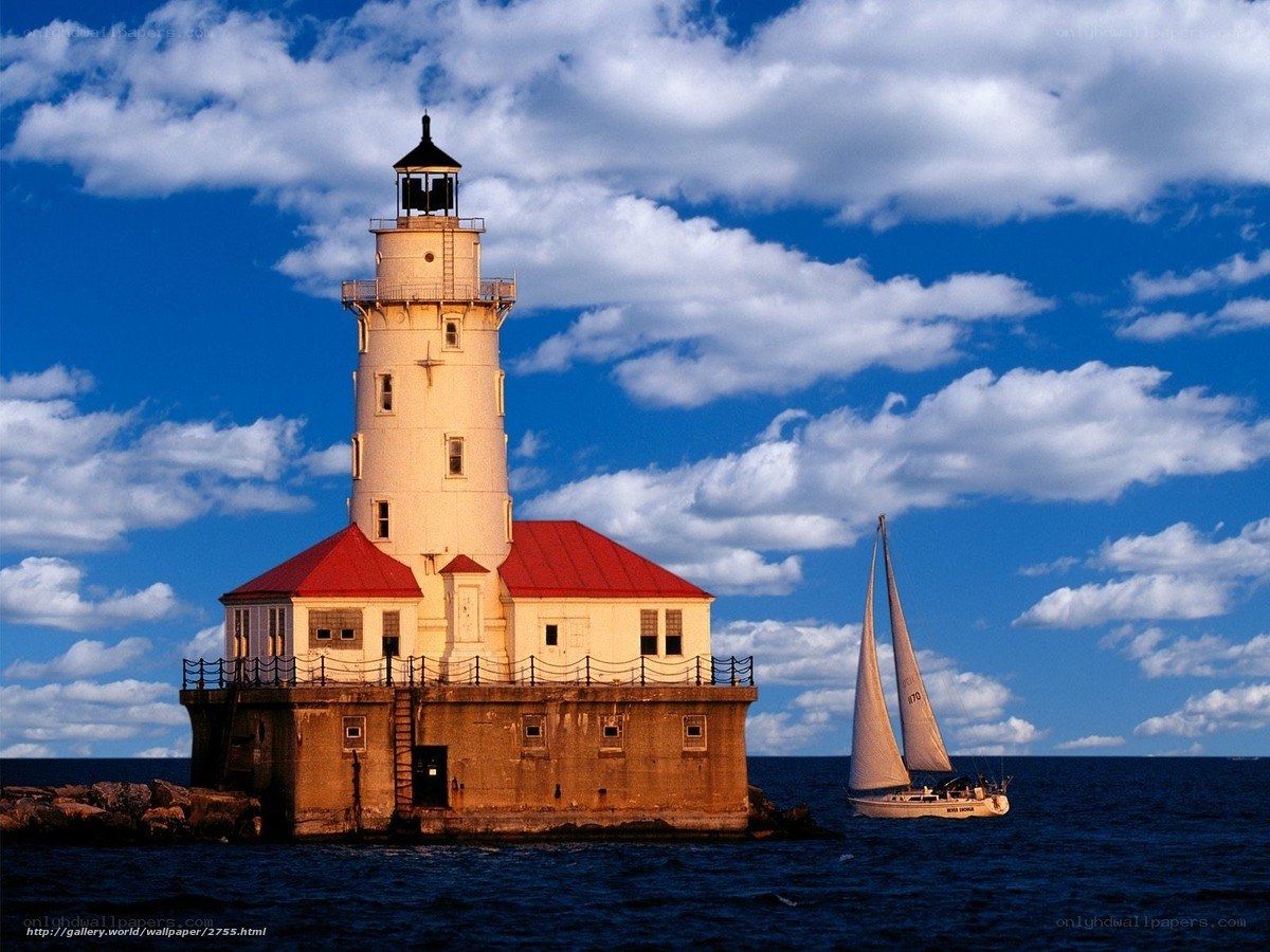 Lighthouse and sailboat on the water