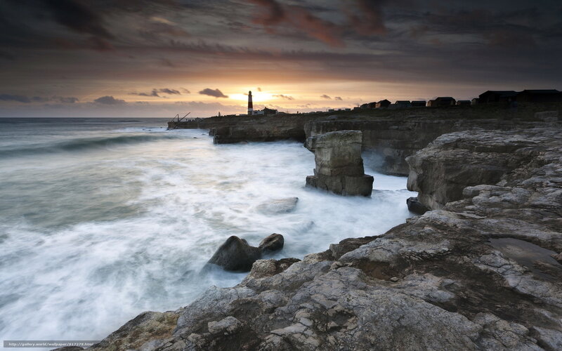 Lighthouse at coastal cliffs