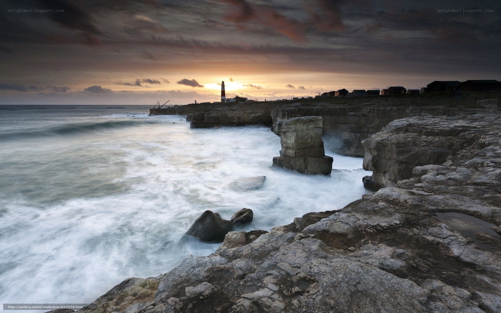 Lighthouse at coastal cliffs