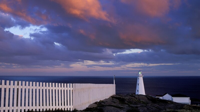 Lighthouse at dusk with colorful sky