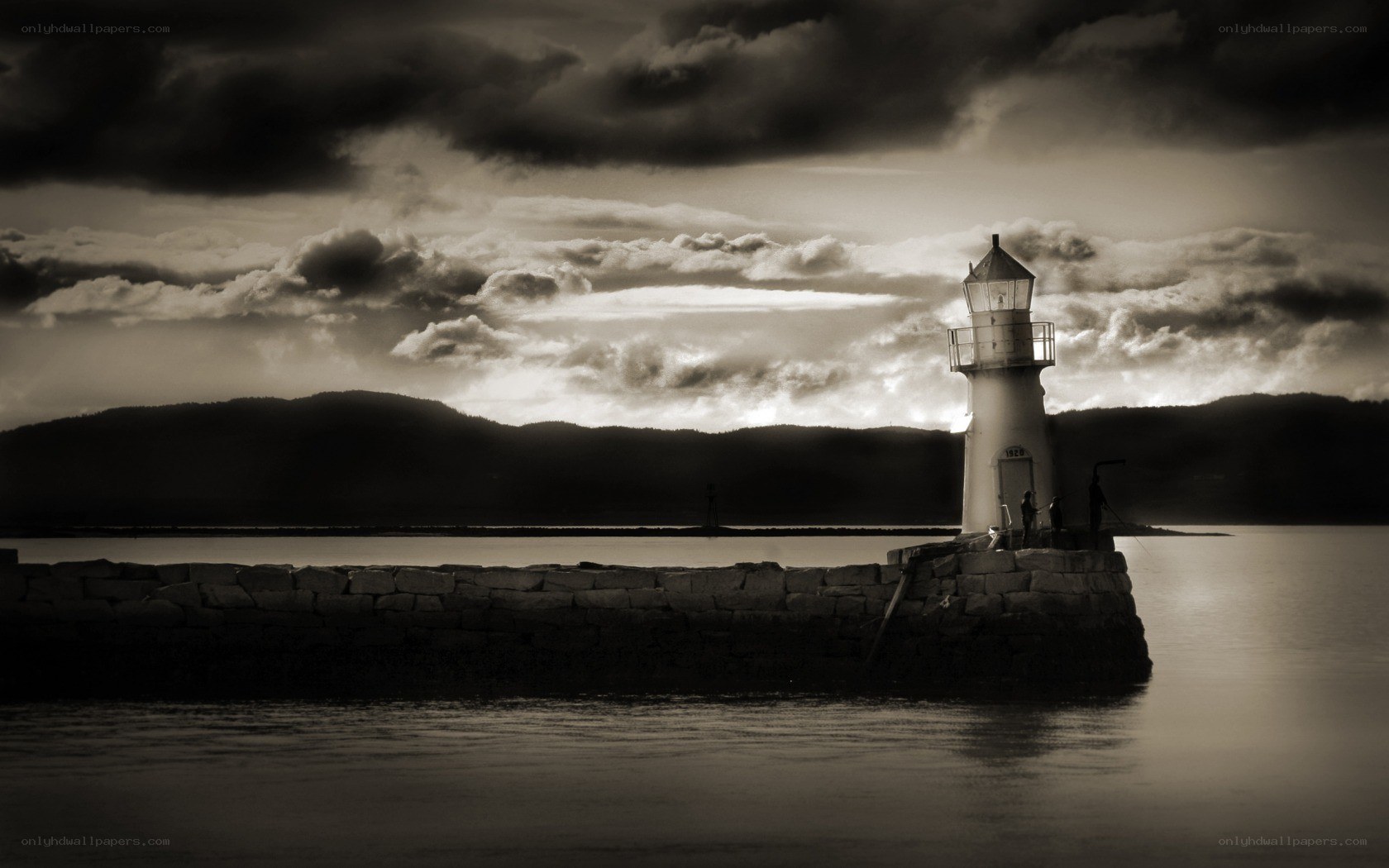 Lighthouse at dusk with stormy sky