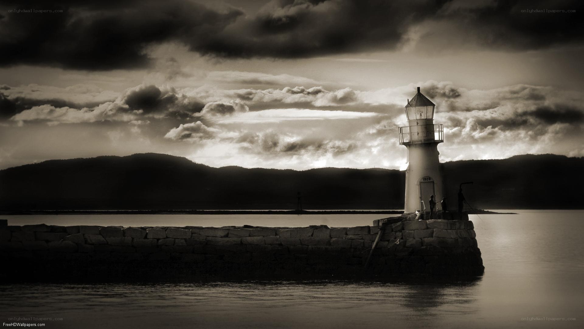 Lighthouse at dusk with stormy sky