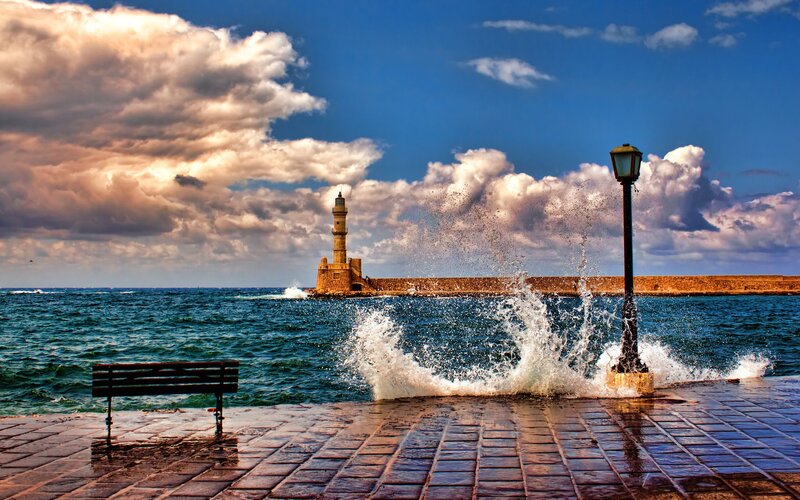 Lighthouse at Harbor Entrance — Blue, Dramatic, Afternoon, Photograph