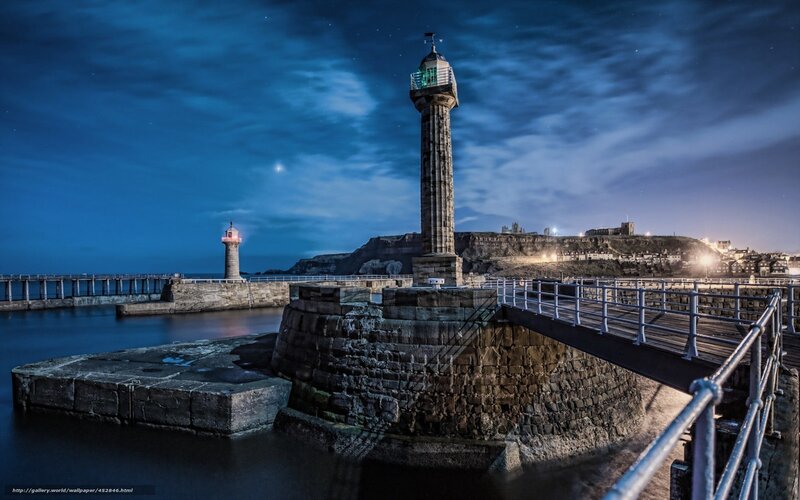 lighthouse at night in port