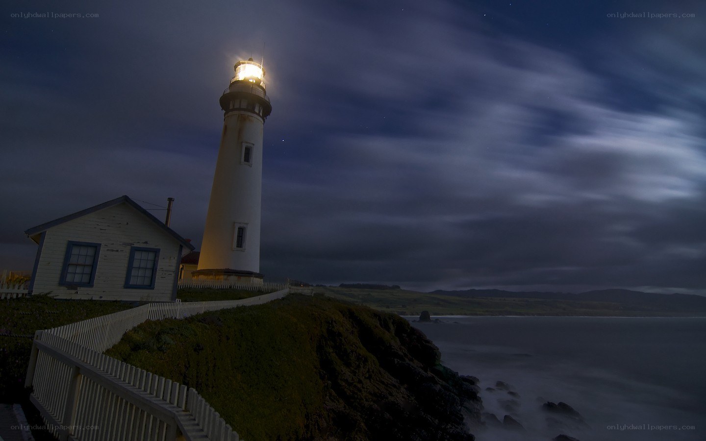 Lighthouse at night on the coast