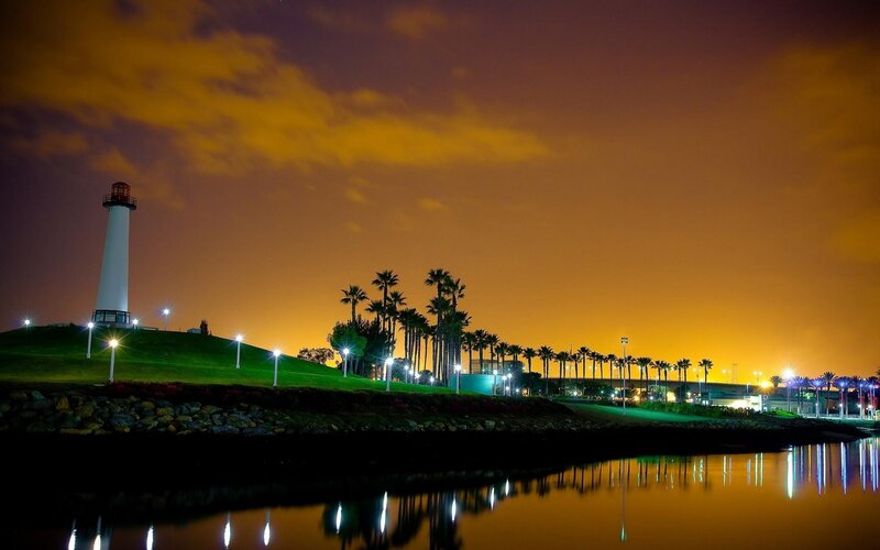 Lighthouse at Night — Orange, Serene