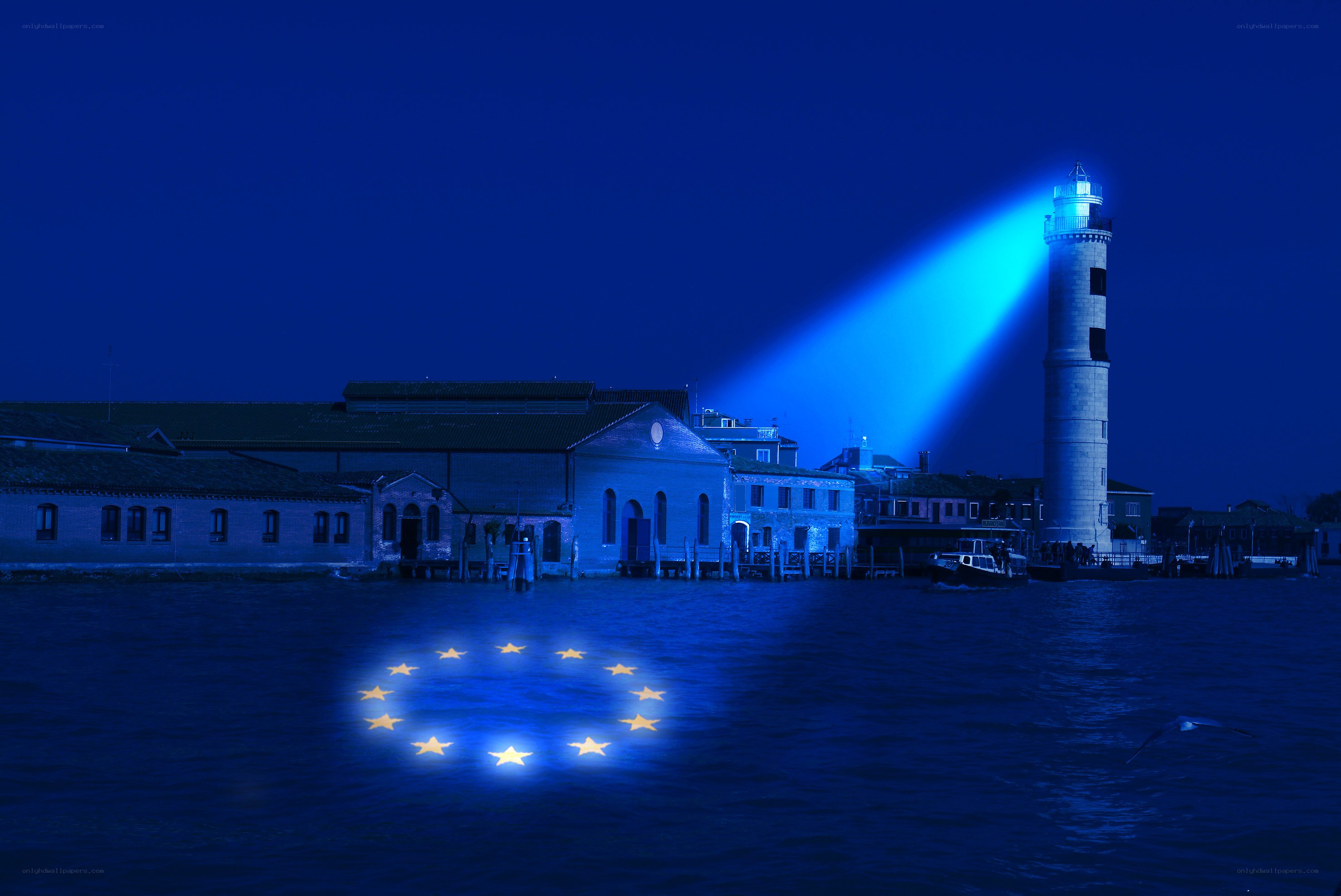 lighthouse at night with EU stars