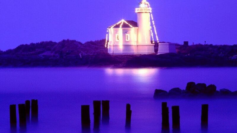 lighthouse at night with lights