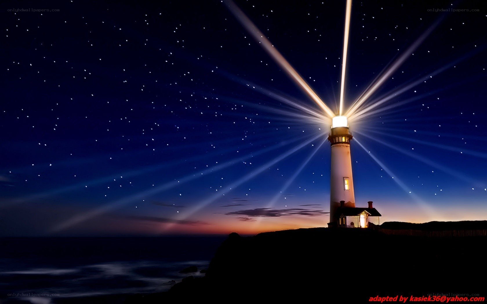 Lighthouse at night with starry sky