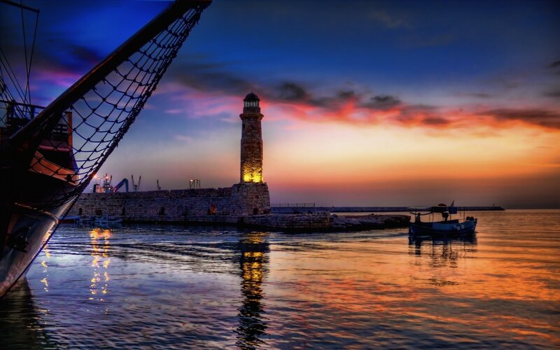 Lighthouse at Sunset — Blue, Dramatic, Photograph, Boat, Harbor, Sky