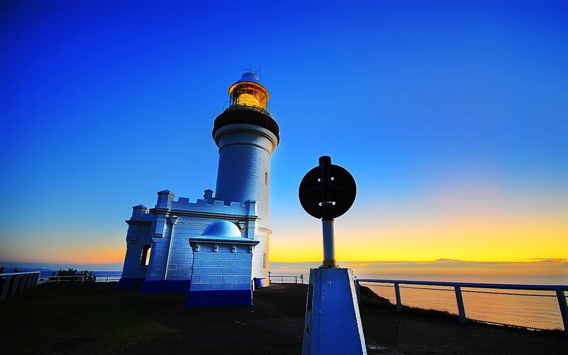 Lighthouse at Sunset — Blue, Dramatic, Photograph, Ocean, Sky, Railing