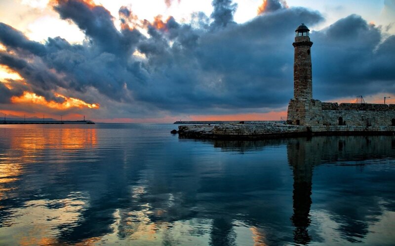 Lighthouse at Sunset — Blue, Dramatic, Photograph, Sea, Clouds, Pier