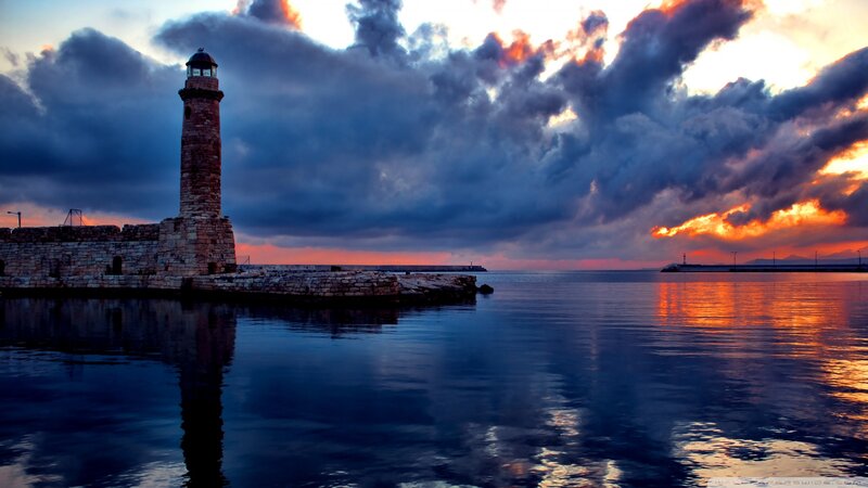 Lighthouse at Sunset — Blue, Dramatic, Photograph, Sea, Clouds
