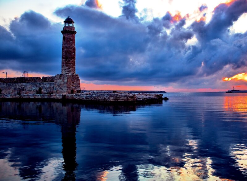 Lighthouse at Sunset — Blue, Dramatic, Photograph, Sea, Sky, Clouds