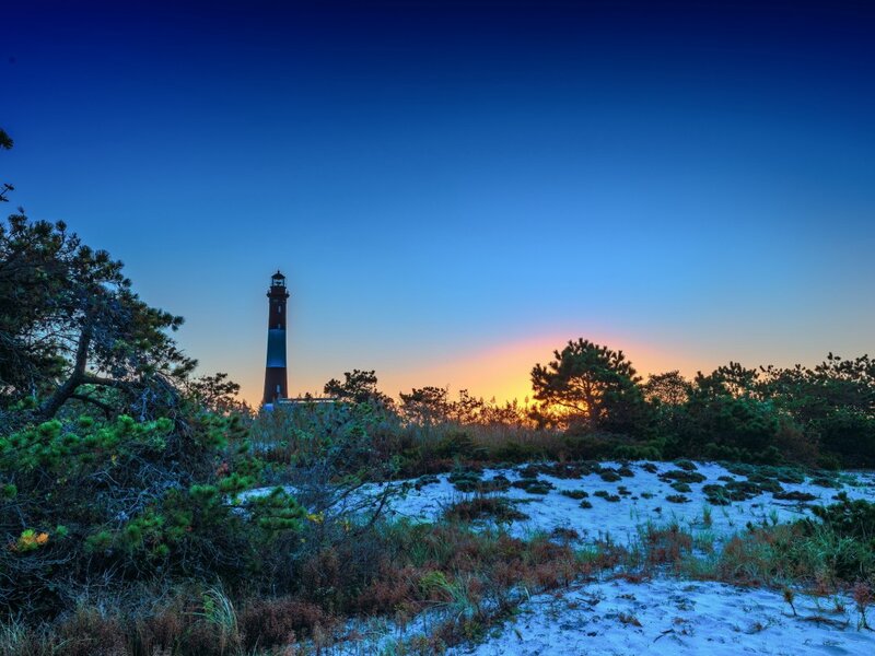 Lighthouse at Sunset — Blue, Serene, Photograph, Sand Dunes, Trees