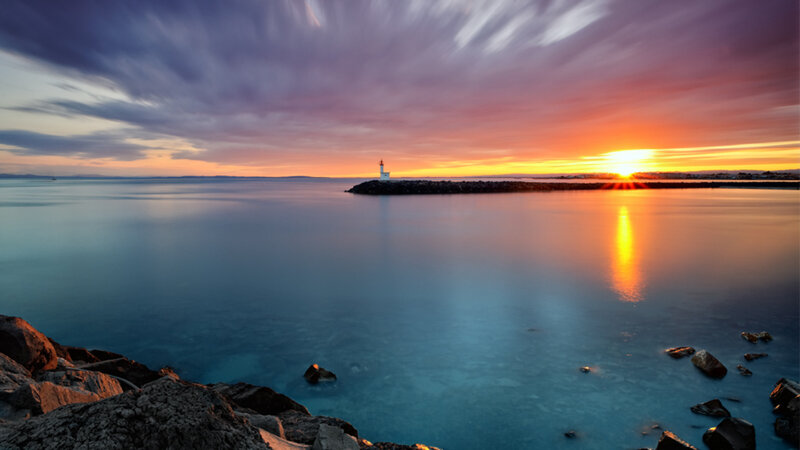 Lighthouse at Sunset — Blue, Serene, Photograph