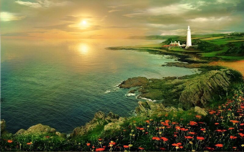 Lighthouse at sunset by the sea