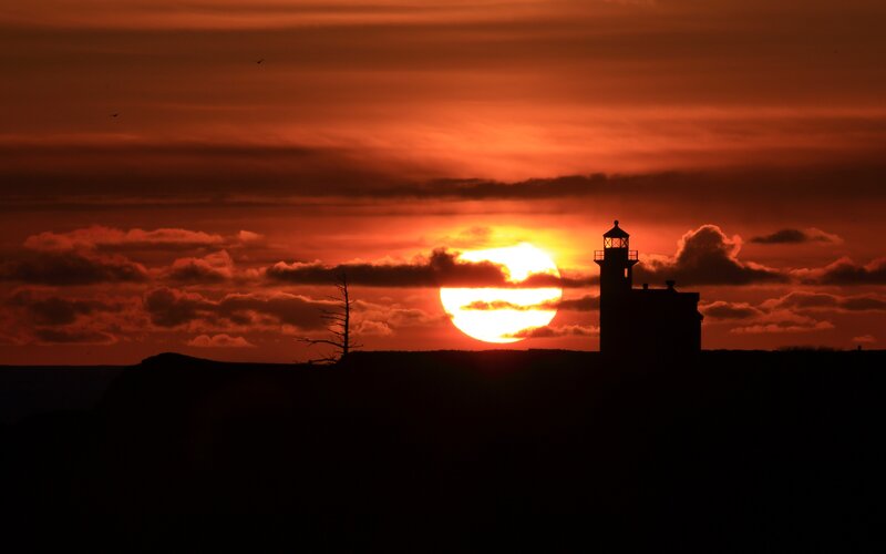 Lighthouse at Sunset — Clouds