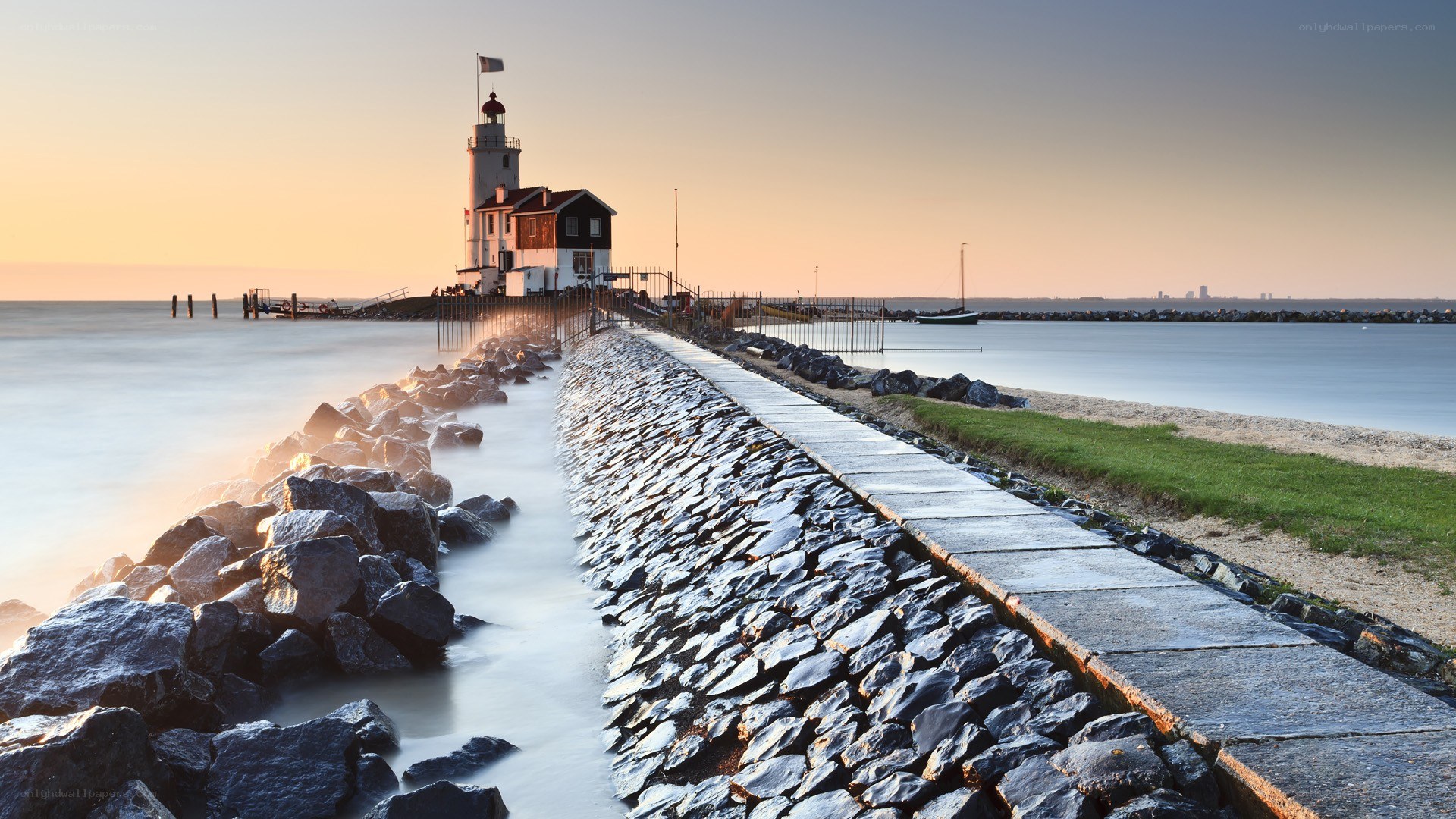Lighthouse at sunset on a calm day