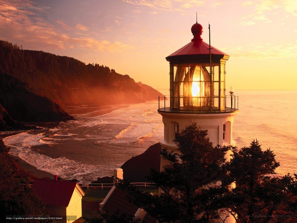 lighthouse at sunset on coast