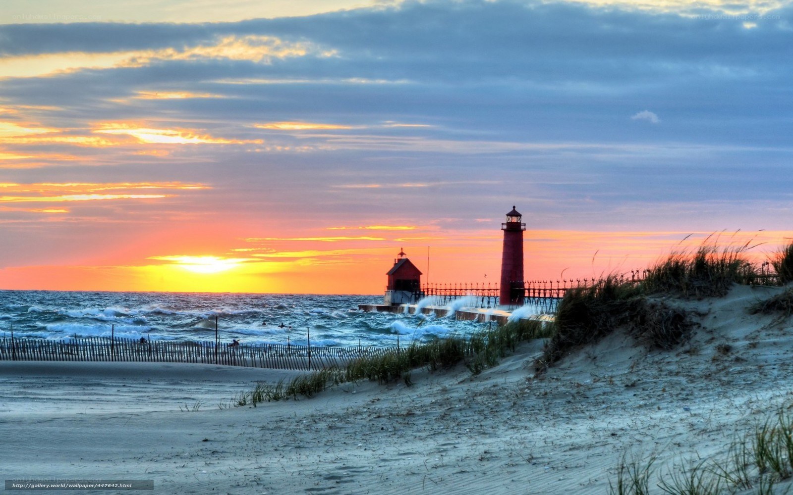 lighthouse at sunset on the beach