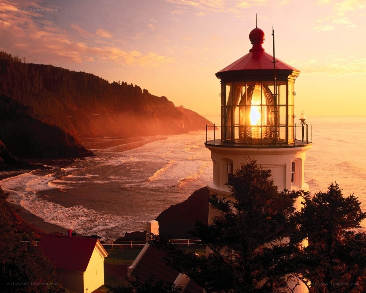 Lighthouse at sunset on the coast