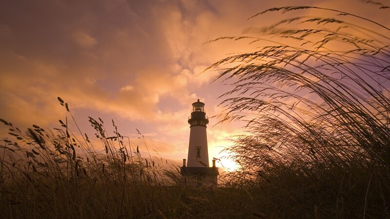 Lighthouse at Sunset — Orange, Dramatic, Photograph, Grass, Sky, Clouds