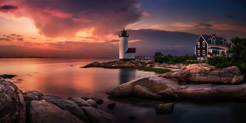Lighthouse at Sunset — Orange, Dramatic, Photograph, House, Rocks, Sea