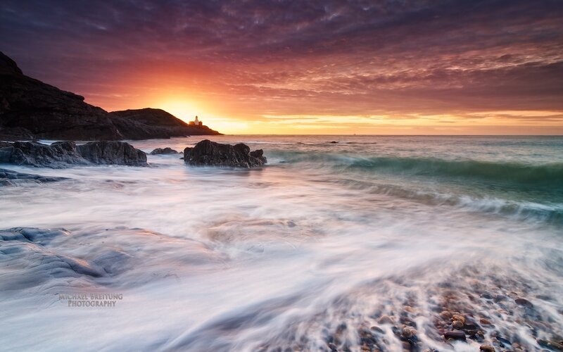 Lighthouse at Sunset — Orange, Dramatic, Photograph, Ocean, Rocks, Sky