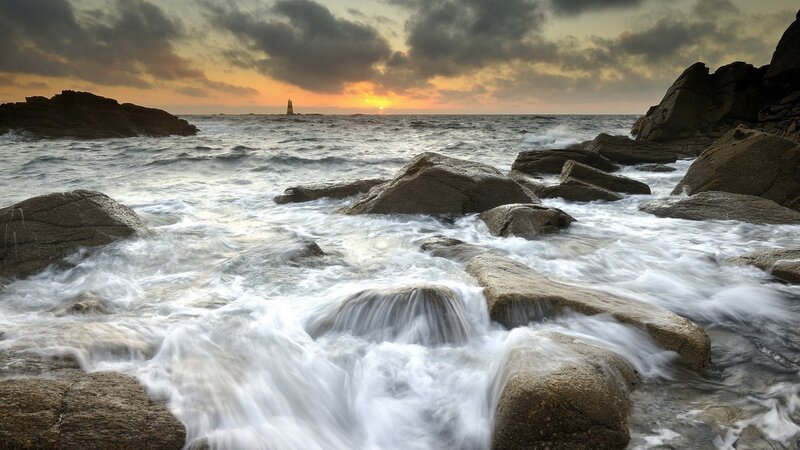 Lighthouse at Sunset — Orange, Dramatic, Photograph, Ocean, Rocks
