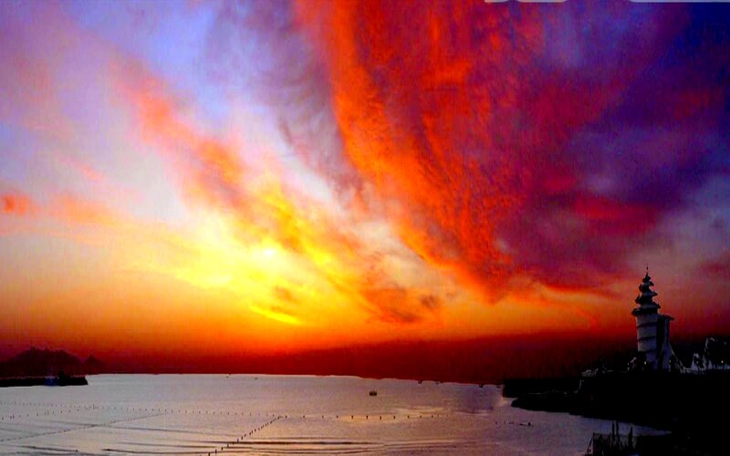 Lighthouse at Sunset — Orange, Dramatic, Photograph, Sea, Sky, Clouds
