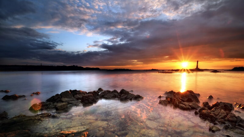 Lighthouse at Sunset — Orange, Dramatic, Photograph, Sun, Rocks