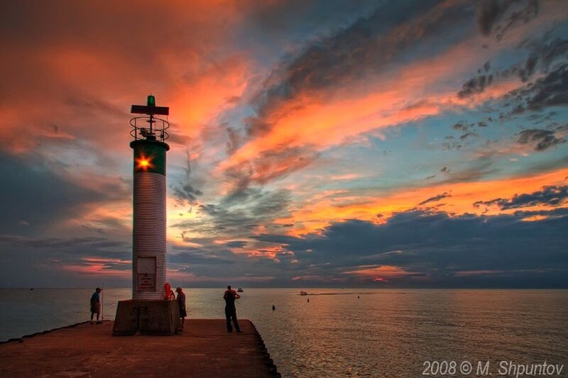 Lighthouse at Sunset — Orange, Dramatic, Photograph